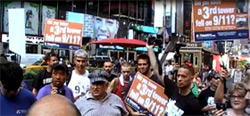 Hundreds of Rethink911 activists made their presence felt on the streets of Manhattan with thought-provoking signs and banners